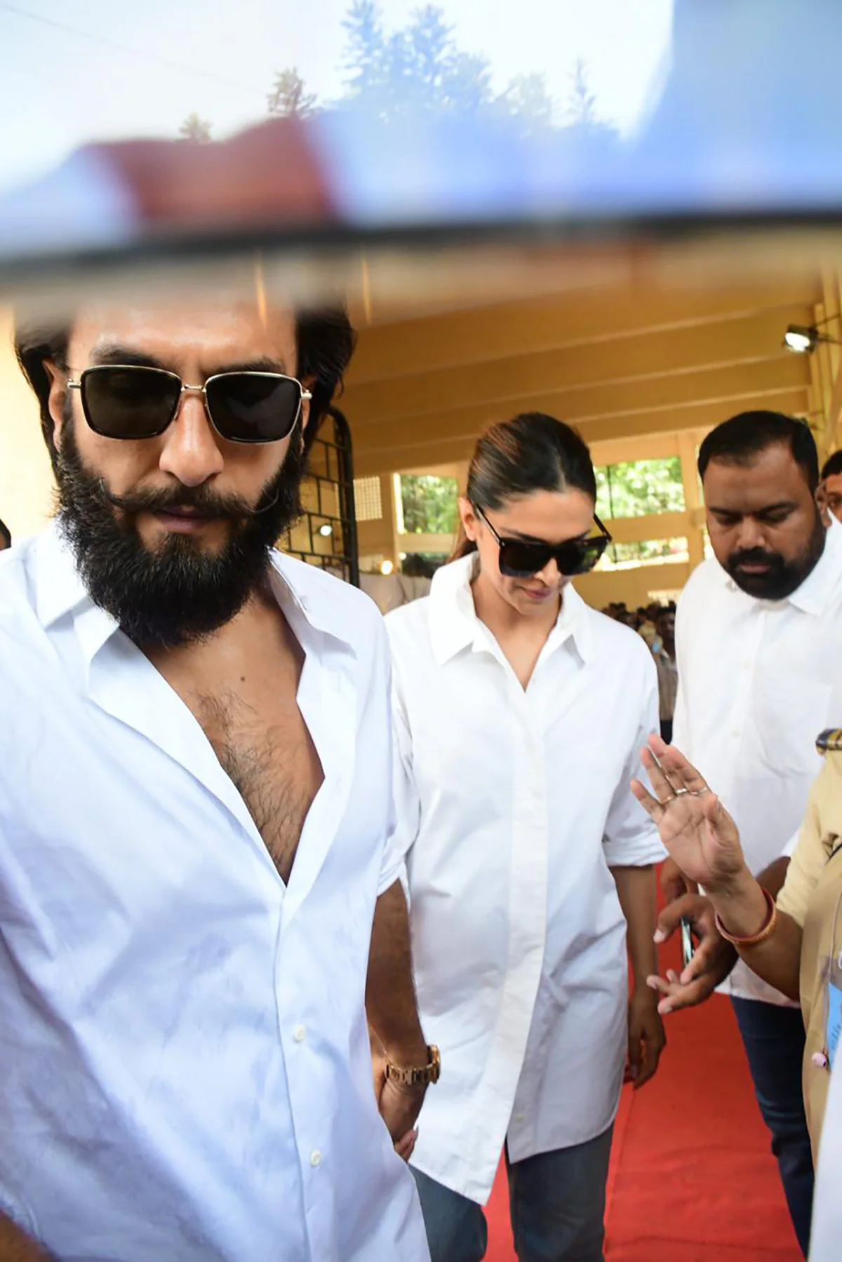 Deepika Padukone spotted with baby bump outside polling station alongside husband Ranveer Singh.